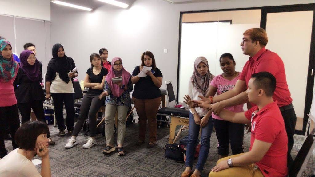Demonstrating a handling technique to participants